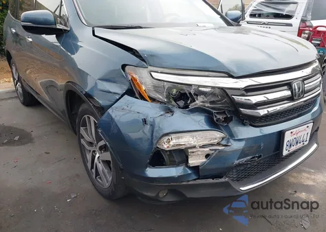2017 Honda Pilot Elite z USA, uszkodzony, nr VIN 5FNYF6H01HB061427